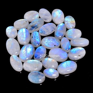 Cabochão de pedra lunar natural arco-íris, lote de pedra lunar azul, formato oval, pedra lunar de fogo, lote de atacado, pedra lunar de nascimento