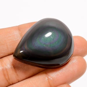 Cabujón de obsidiana de ojo de arcoíris con parte trasera plana y pulida, tamaño 34 x 28 x 14 mm, cristal de ojo de arcoíris.