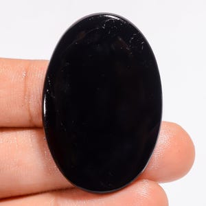 Natürlicher Schwarzer Turmalin Kristall Oval Großer Schwarzer Kristall Schwarzer Ovaler Turmalinstein Flache Rückseite 39X25X4 mm Größe Schwarzer Turmalin Cabochon