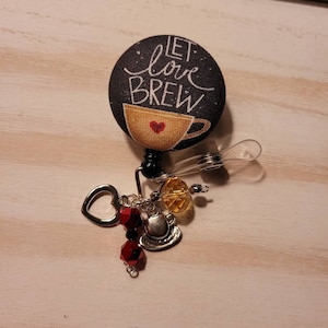 Let Love Brew Coffee Cup Badge Reel