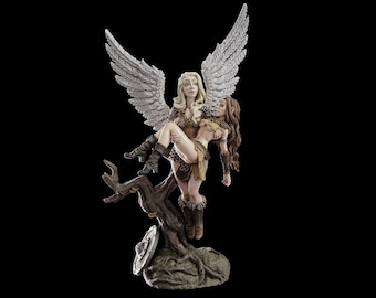 May include: A detailed figurine depicting a winged angel carrying a woman. The angel has large, textured wings and blonde hair. The woman has brown hair and is wearing a tan outfit. The base is a tree trunk.