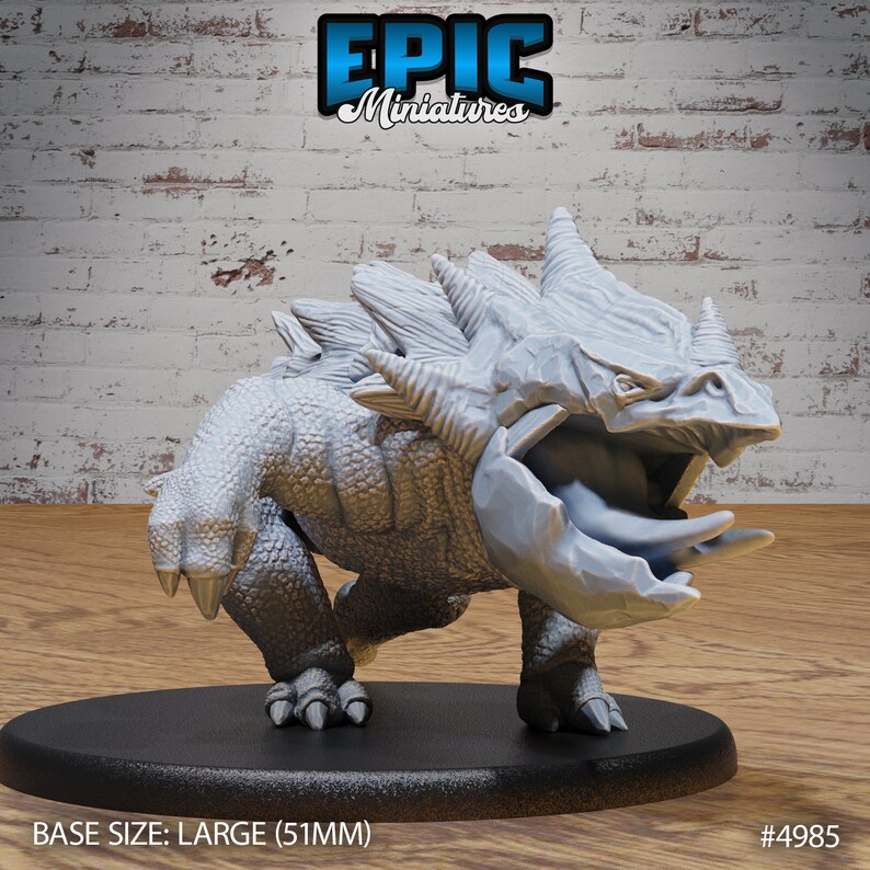 May include: A gray, detailed miniature of a creature with a spiky back, open mouth, and sharp teeth. The miniature is standing on a black base. BASE SIZE: LARGE (51MM) #4985