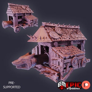 May include: A 3D printed model of a pre-supported, detailed wooden siege weapon with a wolf head on the front. The weapon is on wheels and has a roof with spikes. The model is printed in a light pink color.