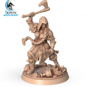 May include: A miniature figurine of a female warrior wearing a hooded cloak and armor, holding an axe and a rope. She is standing on a base with a broken crown and a bottle.