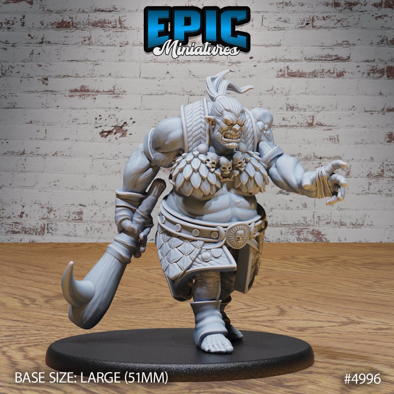 May include: A gray, detailed miniature figurine of a large, muscular, female ogre with a fierce expression. She is wearing a skirt, a belt with a skull buckle, and a necklace of skulls. She is holding a large club in her right hand. The miniature is on a black base. BASE SIZE: LARGE (51MM) #4996
