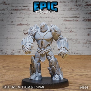 May include: A gray, stone-like figure with a helmet and armor, standing on a black base. The figure is a miniature, measuring 25.5 mm in height. The figure is labeled "EPIC Miniatures #4954".
