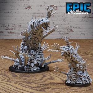 May include: Two skeletal figures made of bones and skulls, one larger than the other, with multiple arms reaching out. The larger figure has a skull head with an open jaw. Both figures are standing on black bases.  EPIC Miniatures.