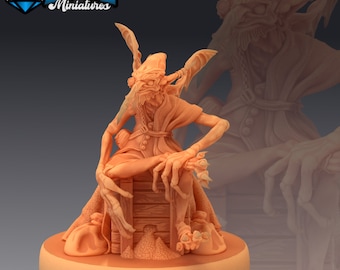May include: A detailed miniature figurine of a goblin-like creature with large ears and wings, sitting on a treasure chest with bags of gold coins. The figurine is painted in a light brown color and has a textured surface.