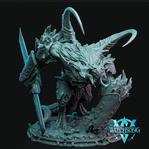 May include: A gray, detailed miniature of a demonic creature with horns, holding a sword and a shield. The miniature is on a base with the text "WITCHSONG" printed on it.