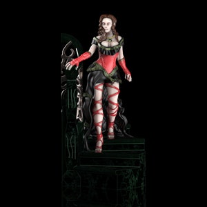 May include: A woman in a red corset and black skirt stands on a green throne. She has long brown hair and is wearing red shoes.