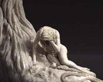 May include: A detailed sculpture depicting a figure with long hair, seated and covering their face, near a tree. A snake and leaves are also present. The sculpture is in shades of beige and gray, with the artist's name, /NERIKSON, visible.