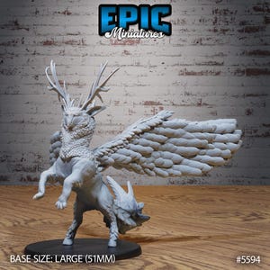 May include: A detailed, unpainted miniature of a winged creature with deer antlers, a bird-like head, and a feline body. The base size is large, approximately 2 inches. The Epic Miniatures logo is visible in the upper right corner.