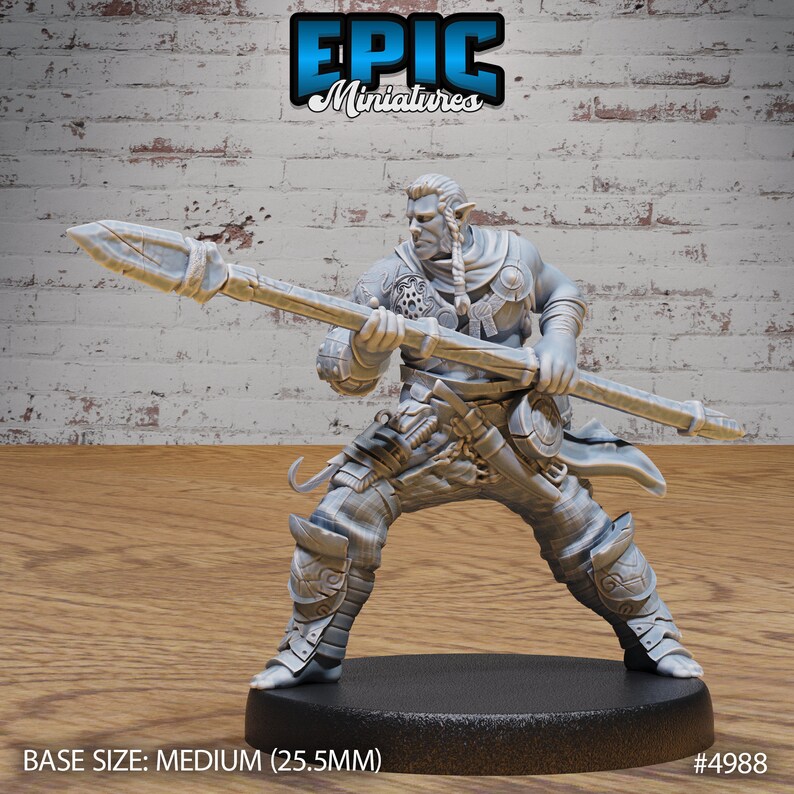 May include: A gray plastic miniature figurine of a warrior holding a spear. The figure is wearing armor and a cloak. The base is medium size (25.5mm). #4988