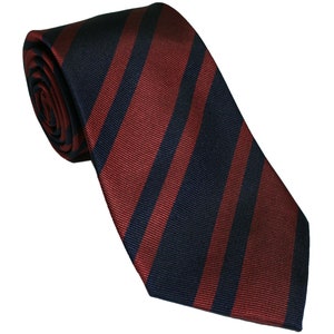 May include: A dark blue and burgundy striped tie. The tie is made of a silky material and has a classic design.
