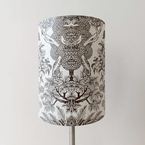 Charming and poetic lampshade with grey Japanese garden motifs on a white background