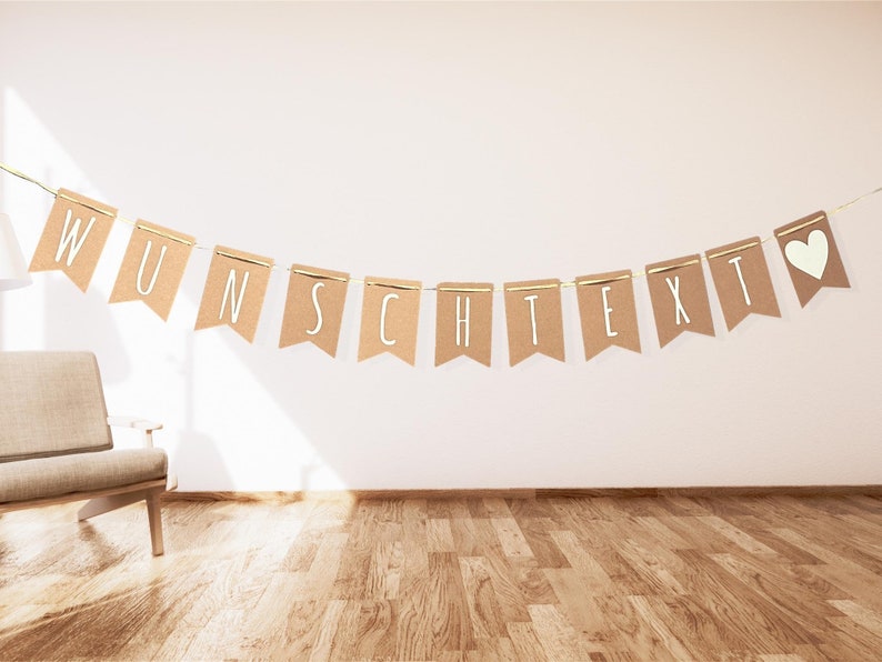 May include: A brown paper banner with the word "WUNSCHTEXT" in white letters and a white heart at the end. The banner is hanging on a white wall above a wooden floor.