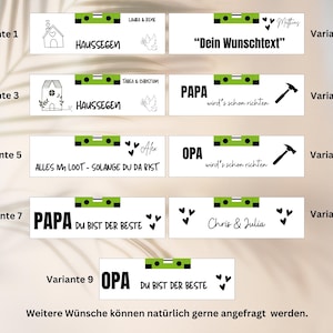 May include: Nine different variations of a green and black level tool with a hammer and hearts. The text on the level tool reads "Papa", "Opa", "Alles im Loot - Solange du da bist", "Du bist der beste", "wird's schon richten", "Dein Wunschtext", and "Haus Segen".