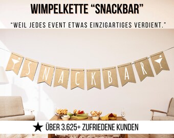 May include: A brown paper banner with the words "SNACKBAR" in white letters. The banner is strung up with string and has a small cocktail glass icon on each end. The text "WEIL JEDES EVENT ETWAS EINZIGARTIGES VERDIENT." is also visible in the image.