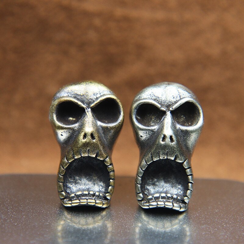 Buy Double Sided Skull Face Knife Beads Paracord Tools EDC Lanyard Pendants  Accessories Hanging Umbrella Rope Zipper Charm Paracord Bead Online in  India 