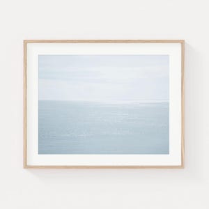 Abstract ocean reflection wall art with soft neutral water tones in a minimal coastal composition.