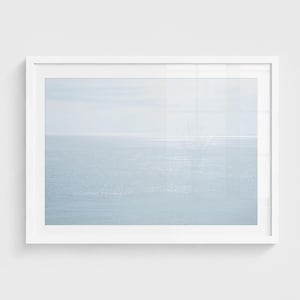 Abstract ocean reflection wall art with soft neutral water tones in a minimal coastal composition.