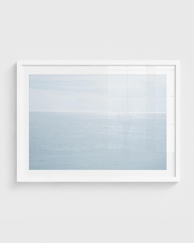 Abstract ocean reflection wall art with soft neutral water tones in a minimal coastal composition.