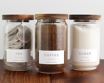 Juego de 3 tarros de cristal para té, café y azúcar: botes de almacenamiento de 750 ml con etiqueta blanca impermeable y tapa hermética de acacia para organizar la despensa