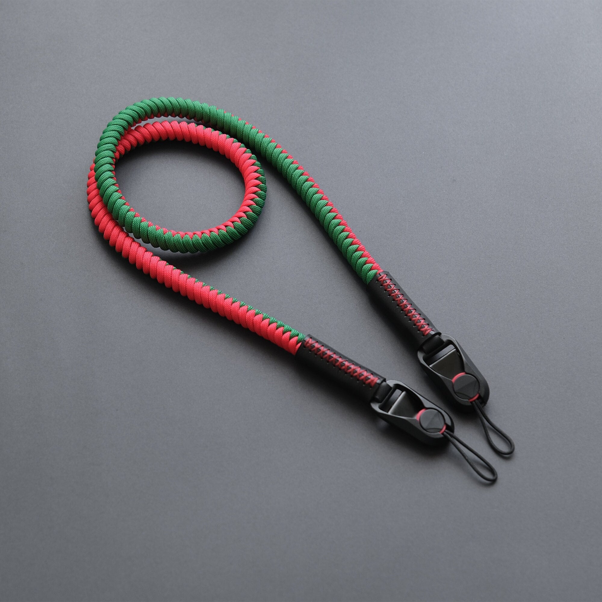 Correa de paracord para cámara, diseño similar al de Peak, correa roja/verde