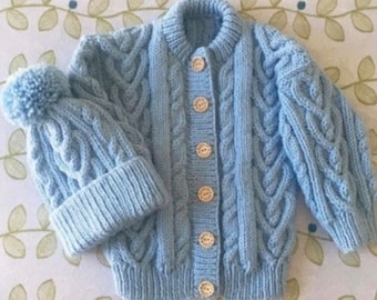 Aran Heart cardigan made to order. Hat comes with furry bobble not woollen one as in picture. if you require woollen one message me