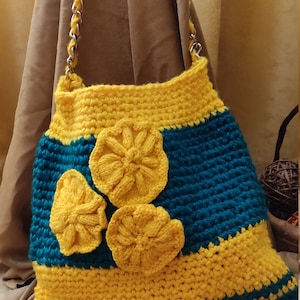 Great hand-knitted women's shoulder bag in fresh colors.