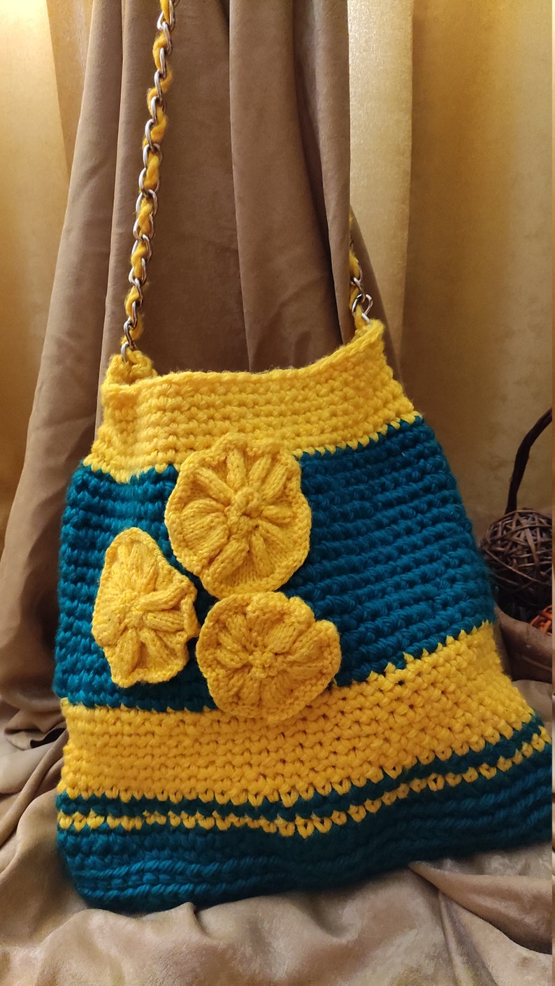 Great hand-knitted women's shoulder bag in fresh colors.