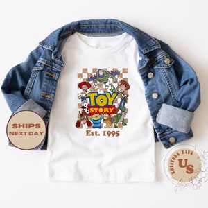 Toy Story Est. 1995 Toddler Shirt, Checkered Toy Story Toddler T-Shirt, Toy Story Since Shirt, Disney Toy Story Baby Onesie®