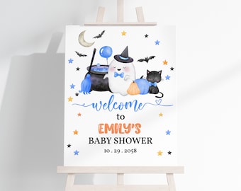 Könnte beinhalten: Ein Willkommenszeichen für eine Babyparty mit einem Geist, einer schwarzen Katze und einem Kessel. Das Schild lautet "Willkommen zu Emilys Babyparty 10.29.2058".