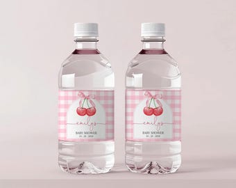 May include: Two clear plastic water bottles with pink and white gingham labels. The labels feature a watercolor illustration of two cherries with a pink ribbon and the text "emily's Baby Shower 10.28.2023".