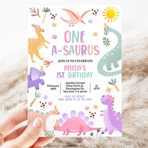 May include: A colorful dinosaur-themed birthday invitation with the text "One A-saurus Amelia's 1st Birthday" and details for the party, including the date, time, and location. The invitation features a variety of dinosaurs in pink, purple, green, and orange.