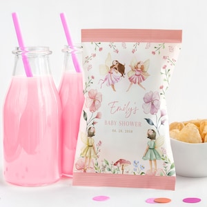 May include: Pink and white chip bag with a floral design and two fairies. The bag says "Emily's Baby Shower 04.28.2058".