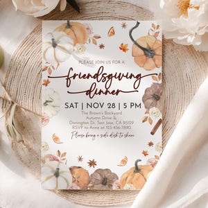 May include: A Friendsgiving dinner invitation featuring watercolor pumpkins, leaves, and floral accents. The invitation includes the date, time, and location: The Brown's Backyard, Autumn Drive & Donington Dr, San Jose, CA 95129. RSVP to Anne.