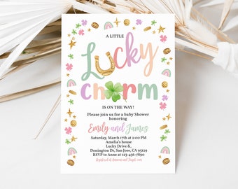 May include: A baby shower invitation with a green, pink and gold colour scheme. The invitation features a shamrock, horseshoe and gold coins. The text reads "A Little Lucky Charm is on the way!" and includes the names "Emily and James", the date and time of the shower, and the address.