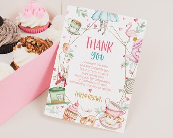 May include: A pink and gold thank you card with a watercolor illustration of Alice in Wonderland characters. The text reads "Thank You" and "I enjoyed the cake and the presents too, but my favorite part was seeing you! Thank you for celebrating my birthday with me! and making this day so special! Emma Brown."