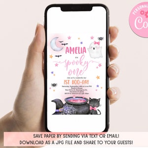 May include: A pink and purple Halloween-themed first birthday party invitation with a ghost, a witch's hat, a cauldron, and a black cat. The invitation says "Amelia is a Spooky One" and includes the date, time, and location of the party. It also says "RSVP to Anne at 123-456-7890".