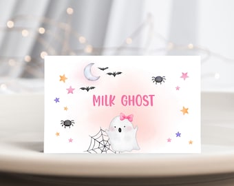 May include: A white card with a pink and white ghost illustration, a pink bow, and the text "MILK GHOST". The background is pink with stars, bats, and a crescent moon.