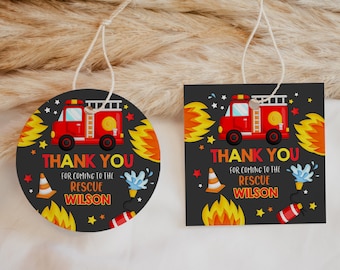May include: Red and black thank you tags featuring a cartoon fire engine, flames, and stars. The text reads "Thank you for coming to the rescue Wilson".