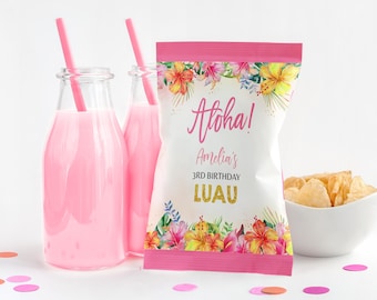 May include: A festive party scene with pink drinks in glass bottles with straws, a bag of chips, and a decorated chip bag with the words "Aloha! Amelia's 3rd Birthday Luau". The chip bag has a floral design.