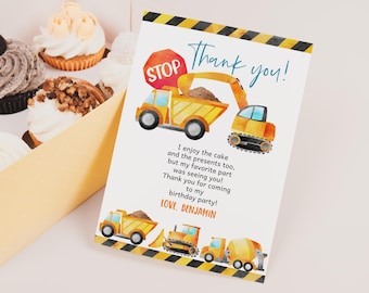 May include: Thank you card with a construction theme. The card features a yellow dump truck, a yellow excavator, and a yellow cement mixer. The text on the card reads "Thank you!" and "I enjoy the cake and the presents too, but my favorite part was seeing you! Thank you for coming to my birthday party! LOVE, BENJAMIN".