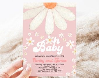 May include: Pink baby shower invitation featuring a white daisy flower design. The text reads "Oh Baby" in a retro font and "Join us for a baby shower honouring Emily and James".
