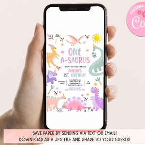 May include: A digital invitation for a first birthday party with a dinosaur theme. The invitation features a pink, purple, and green dinosaur with the text "One-A-saurus" and "Amelia's 1st Birthday".