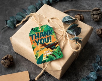 May include: A brown paper gift bag with a green and orange thank you tag. The tag features a dinosaur silhouette and the text "Thank You! For Celebrating With me! Love, Thomas".