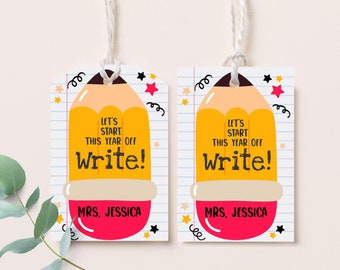 May include: Two yellow pencil-shaped gift tags with the text "Let's start this year off write!" and "Mrs. Jessica" on a white background with black and red stars.