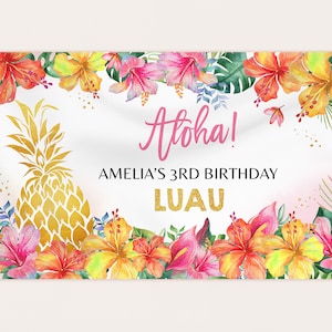 May include: A white banner with a pink and gold "Aloha!" greeting, a gold pineapple, and colorful tropical flowers. The text reads "Amelia's 3rd Birthday Luau".