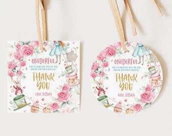 May include: Alice in Wonderland themed thank you tags featuring pink roses, a stack of teacups, a white rabbit, and the text "ONEDERFUL for celebrating with me and making my party magical! Thank you Love, Jessica"